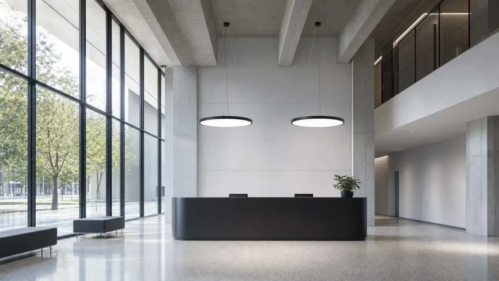 Talla Slim circular pendants in a university reception