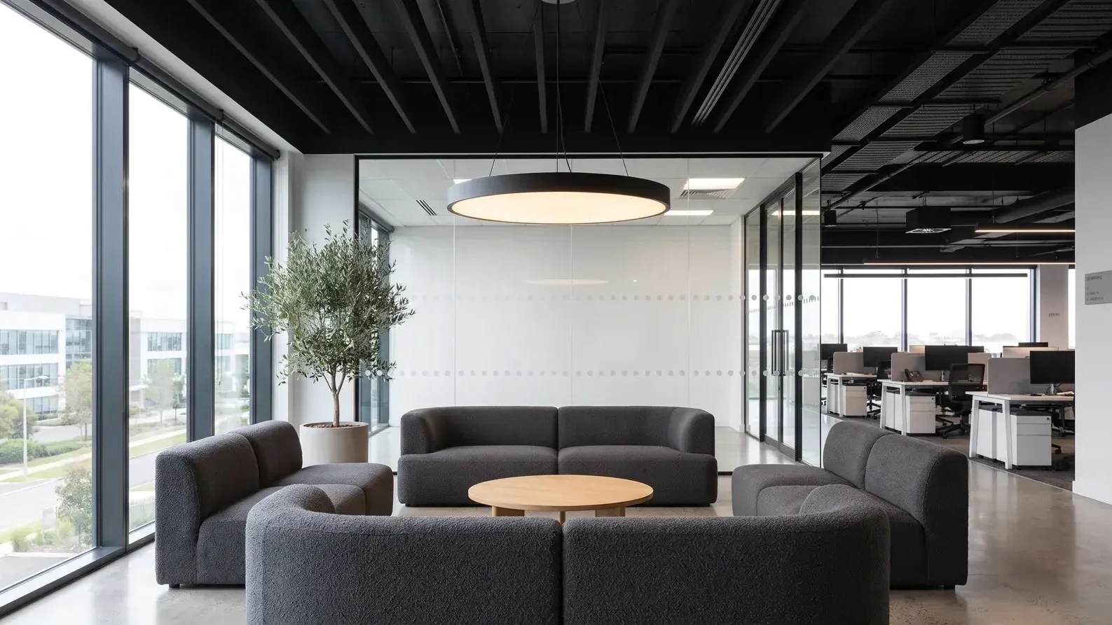 Suspended direct lighting in an office breakout area